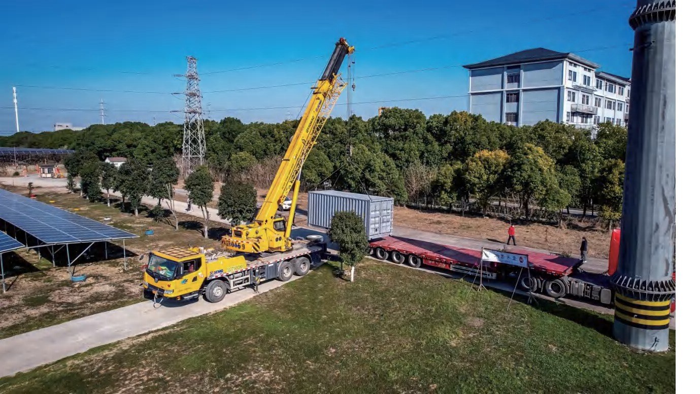 Hoisting container into position